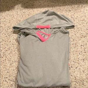 Long sleeve hooded exercise top.